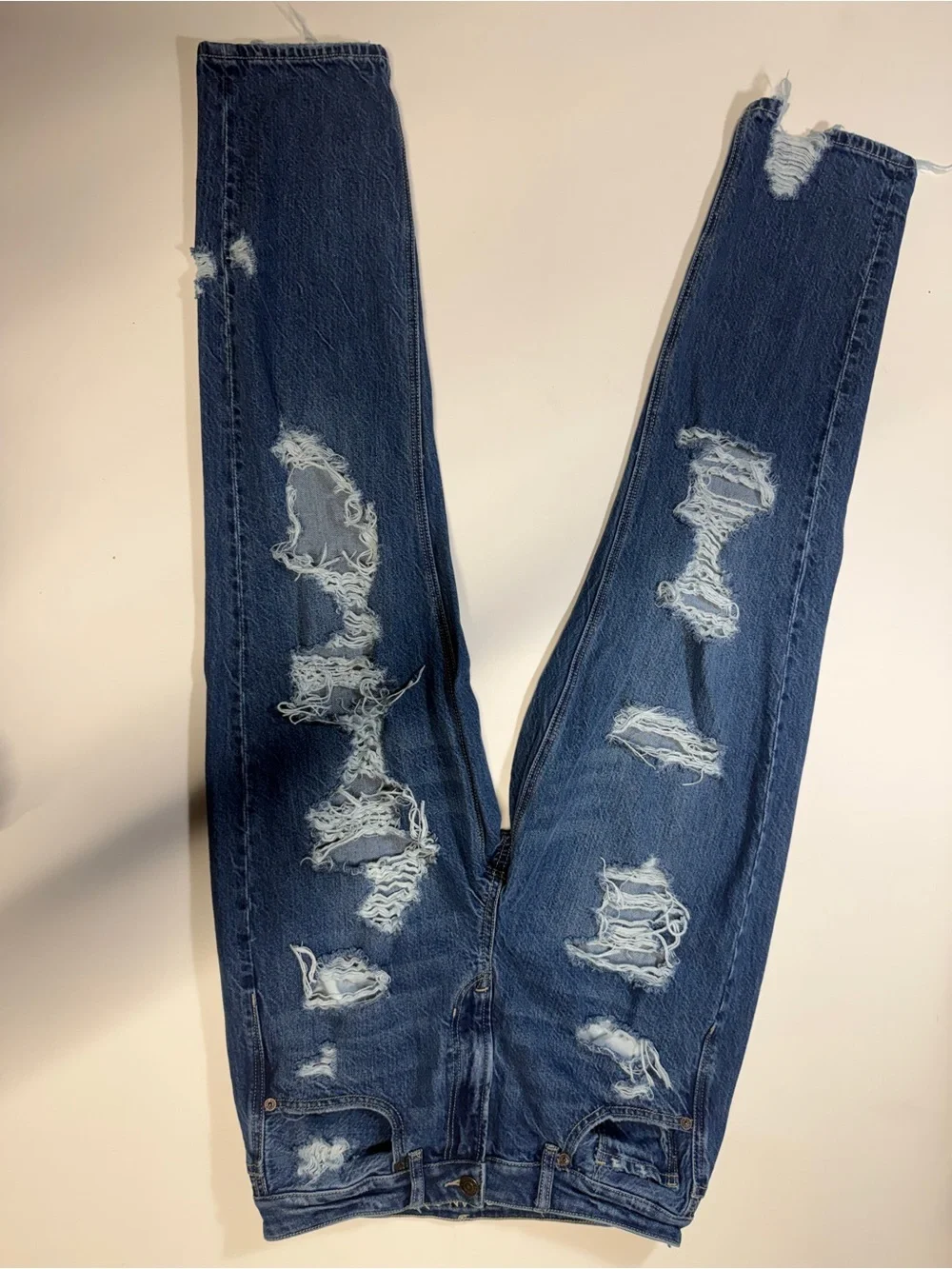 American Eagle Outfitters medium blue distressed denim jeans‎